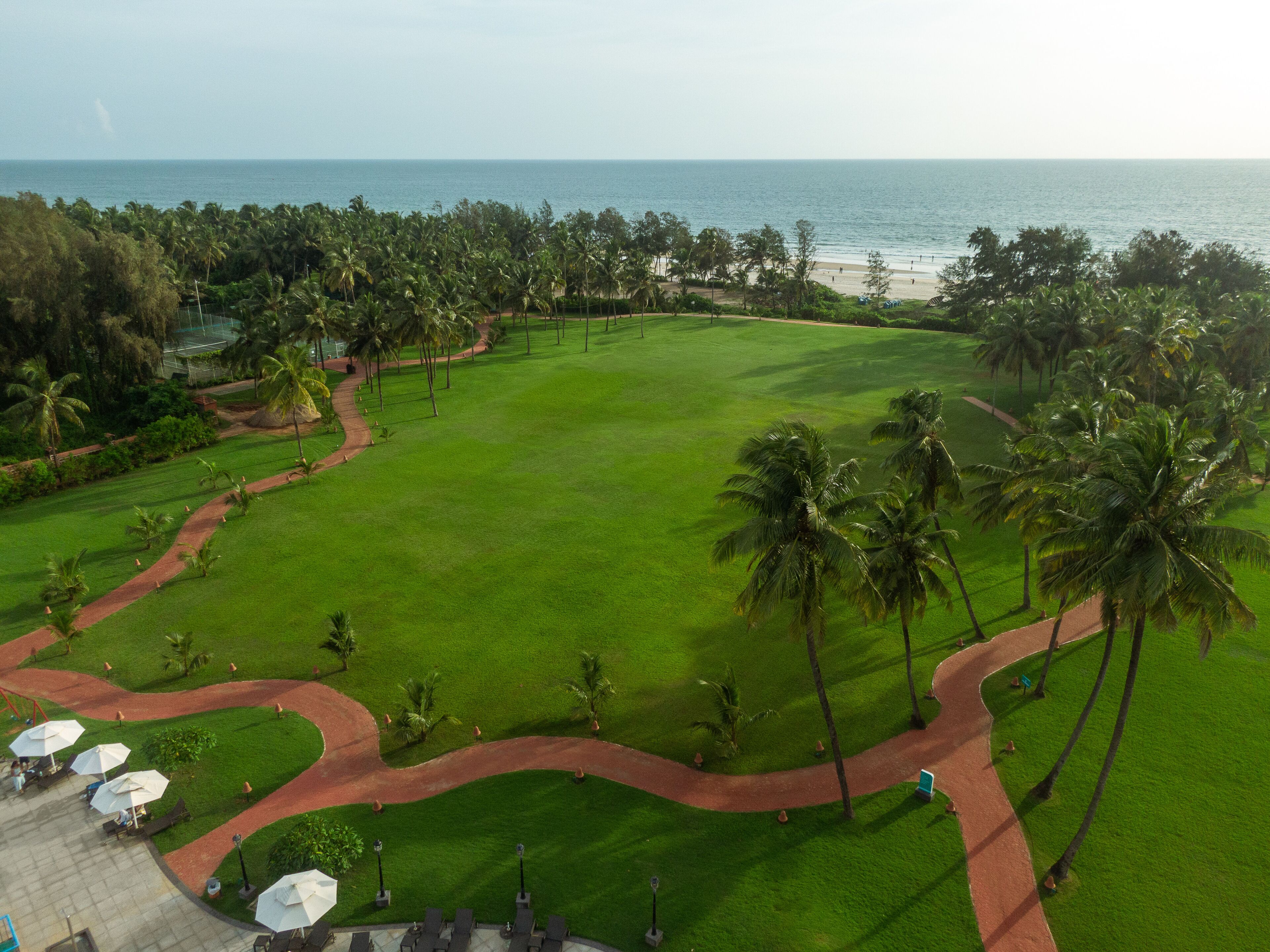 A golf course with a view of the ocean.