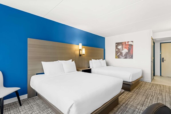 Desk, laptop workspace, blackout drapes, iron/ironing board