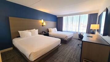 Desk, laptop workspace, blackout drapes, iron/ironing board