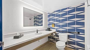 Combined shower/tub, hair dryer, towels, soap