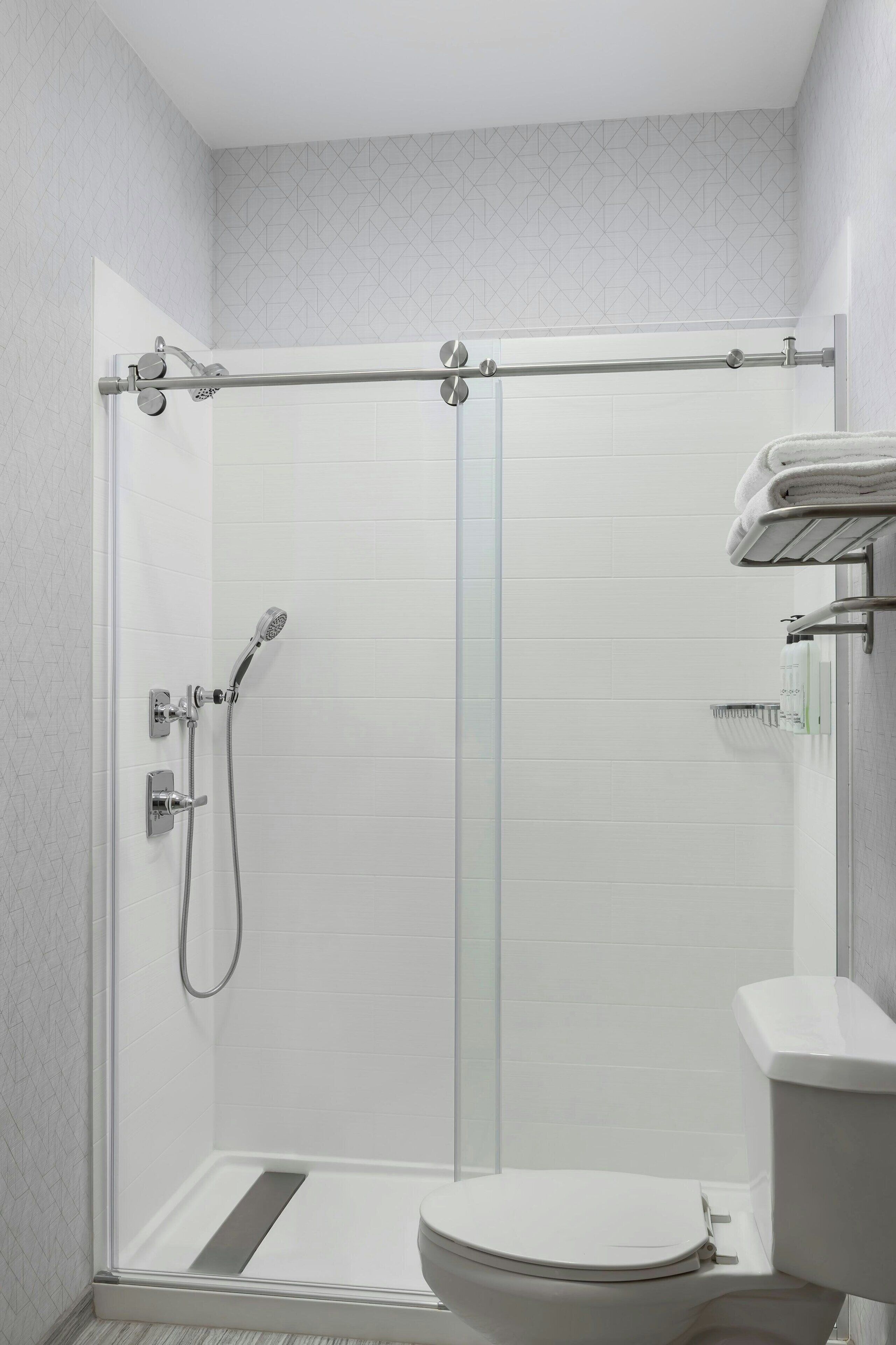 combined shower/bathtub, free toiletries, hair dryer, towels