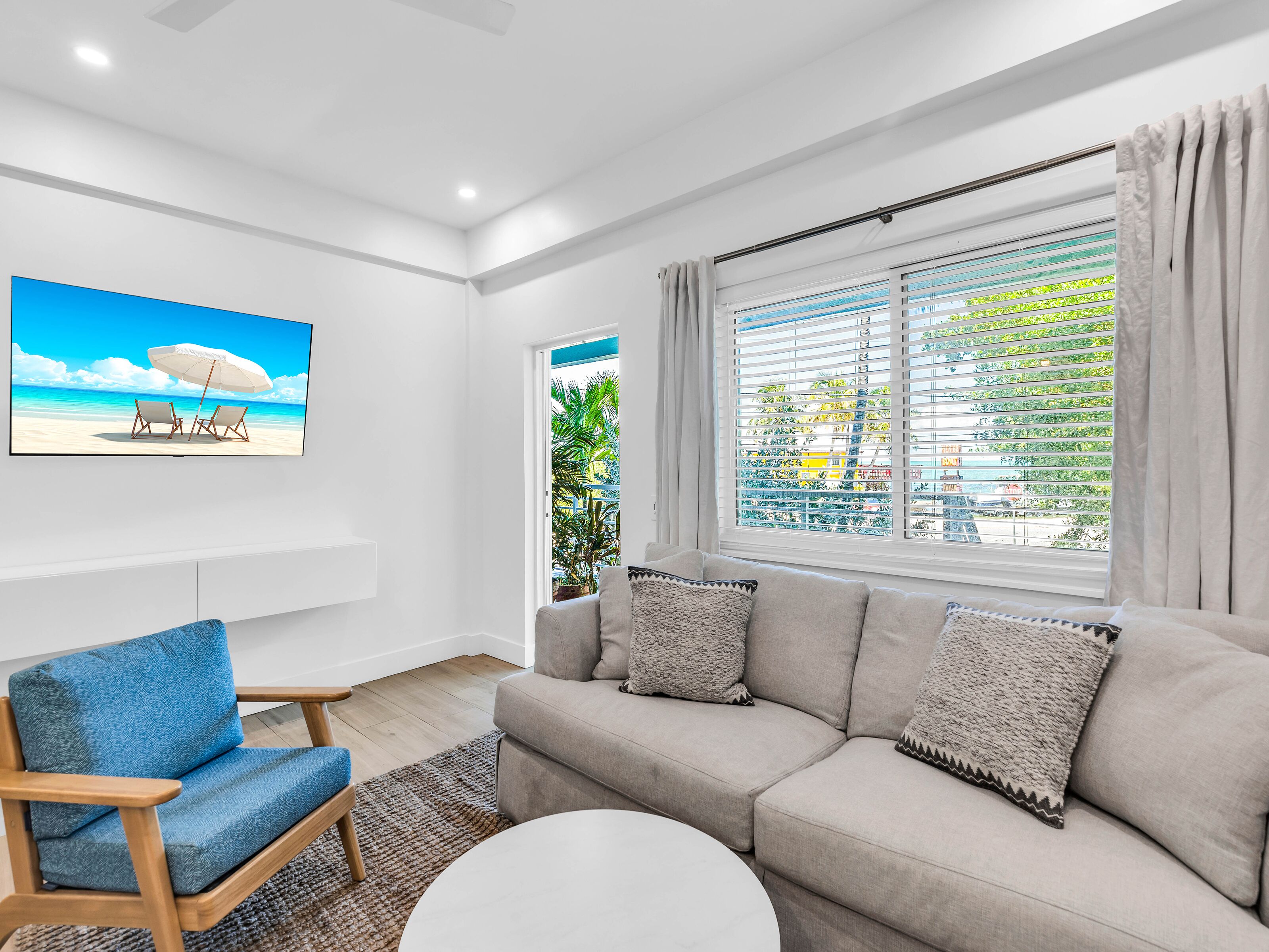 sunset bay suites off main property | living area | 42-inch tv with digital channels