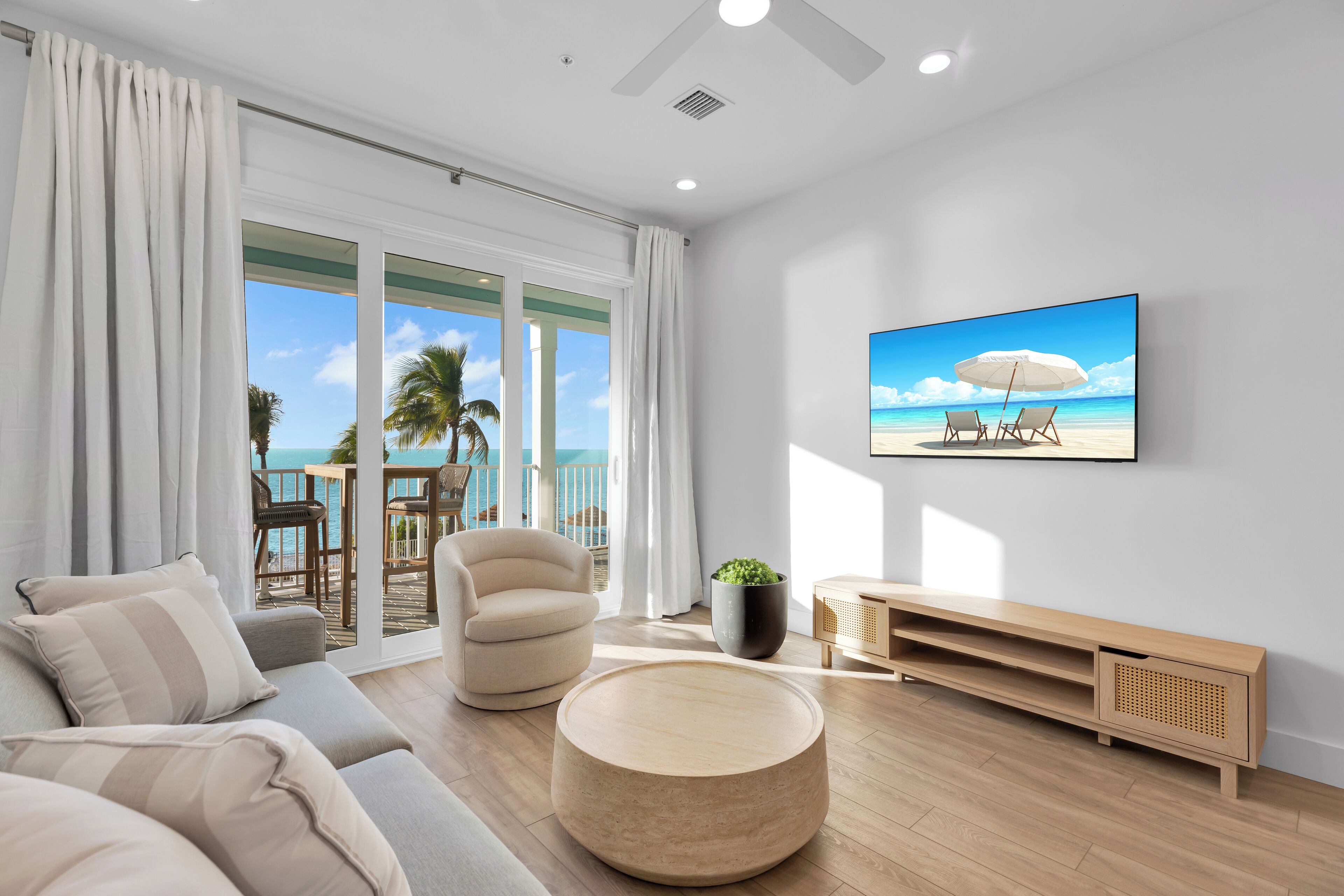 Hibiscus Waterfront 2-Bedroom, Two Bath Master Suite (Brand New) | Living room | 42-inch TV with digital channels