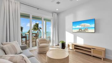 Hibiscus Waterfront 2-Bedroom, Two Bath Master Suite (Brand New) | Living room | 42-inch TV with digital channels