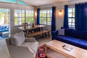Waterfront Treehouse Two-Bedroom Master Suite | Living area | 42-inch TV with digital channels