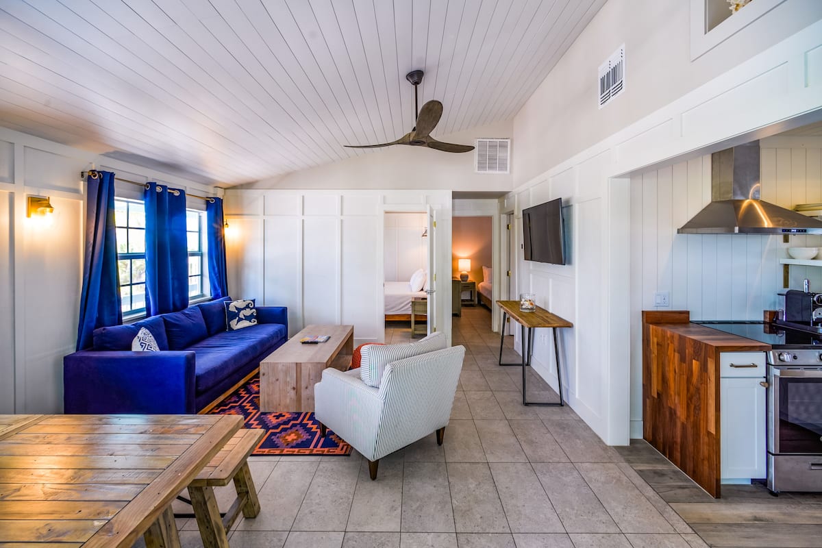 Waterfront Treehouse Two-Bedroom Master Suite | Living area | 42-inch TV with digital channels