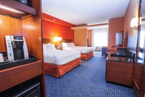 A hotel room with two beds, a minibar, a desk with a television, and a coffee machine. - Fairfield Inn & Suites by Marriott St. John's Newfoundland (St. John's)