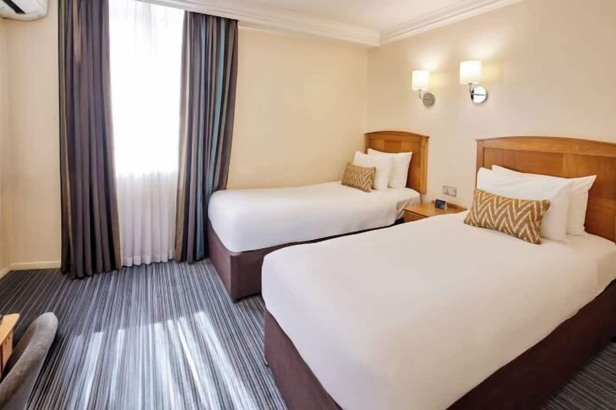 Hypo-allergenic bedding available, in-room safe, desk, laptop workspace