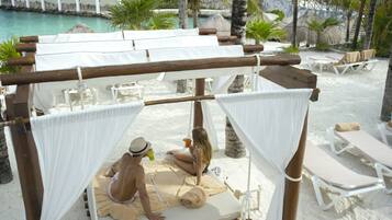 Private beach, white sand, beach towels, beach massages
