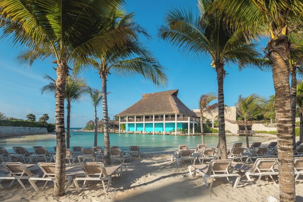 Private beach, white sand, beach towels, beach massages