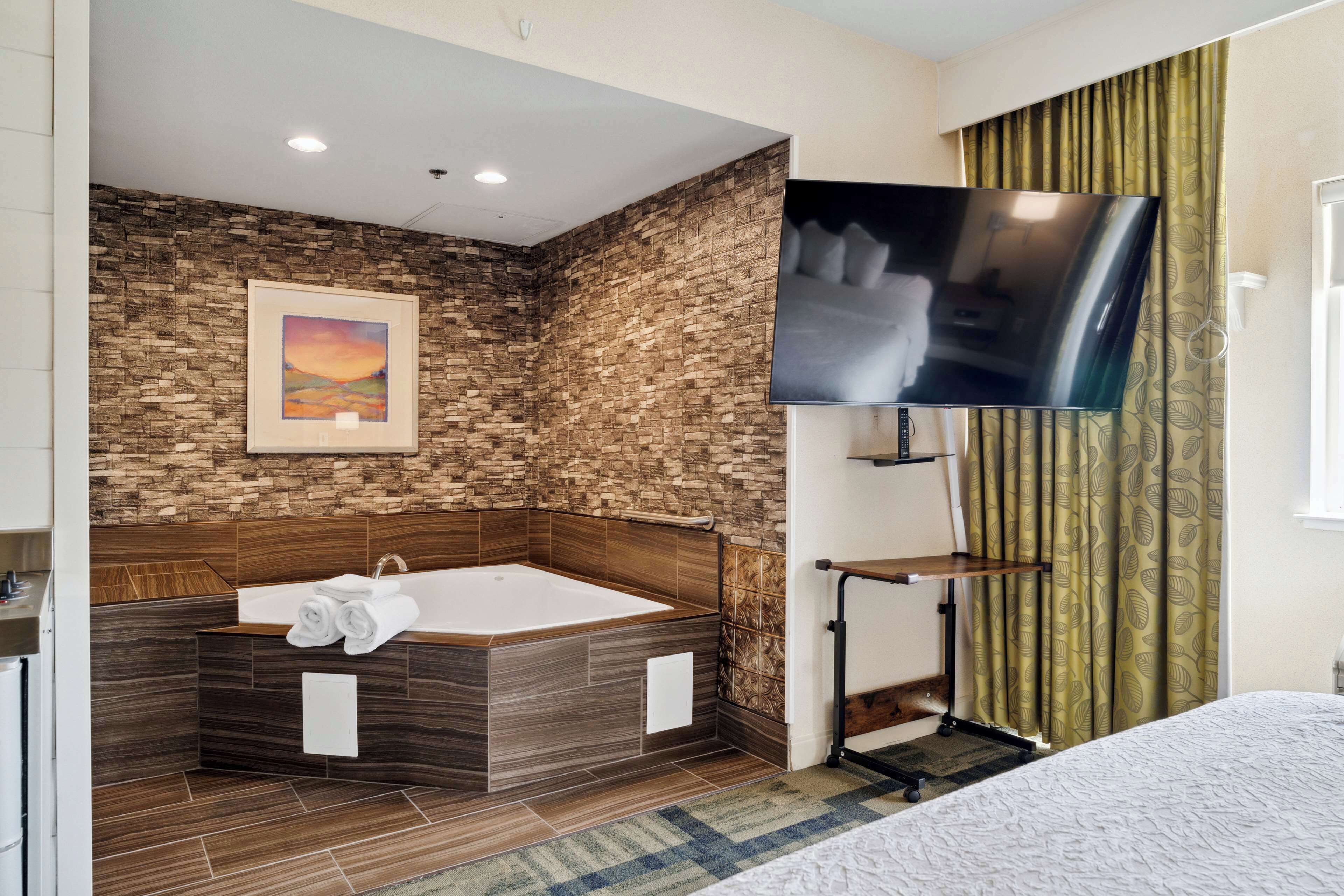 Ropa de cama de alta calidad, camas con pillow-top y muebles diferentes 