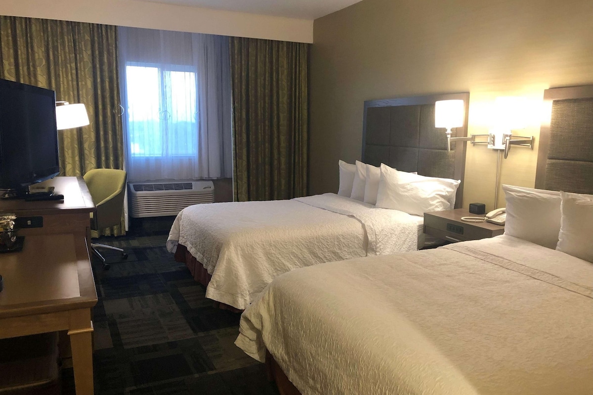 Premium bedding, pillowtop beds, desk, laptop workspace