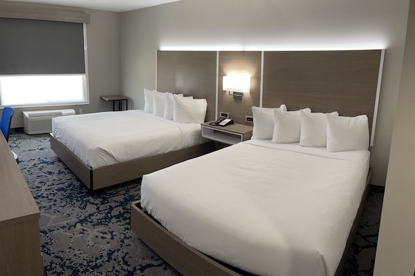 Premium bedding, blackout curtains, iron/ironing board, free WiFi