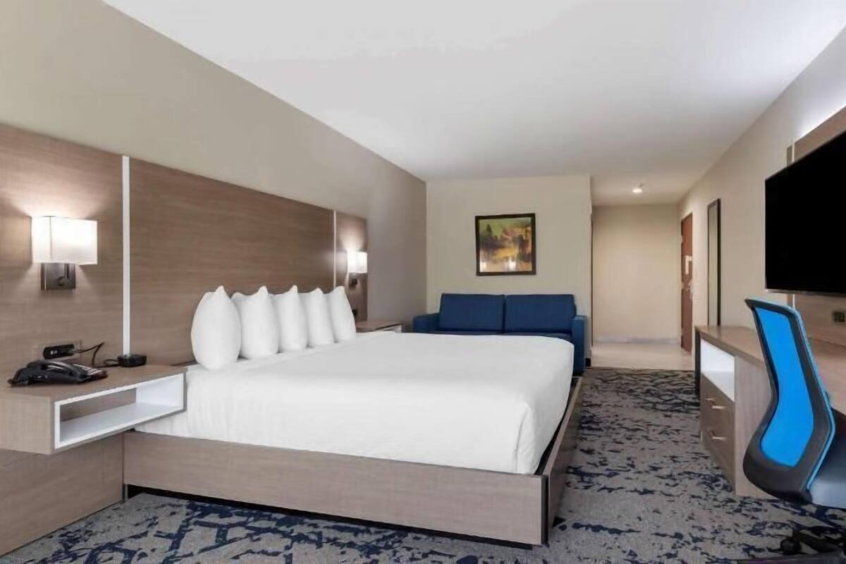 Premium bedding, blackout drapes, iron/ironing board, free WiFi