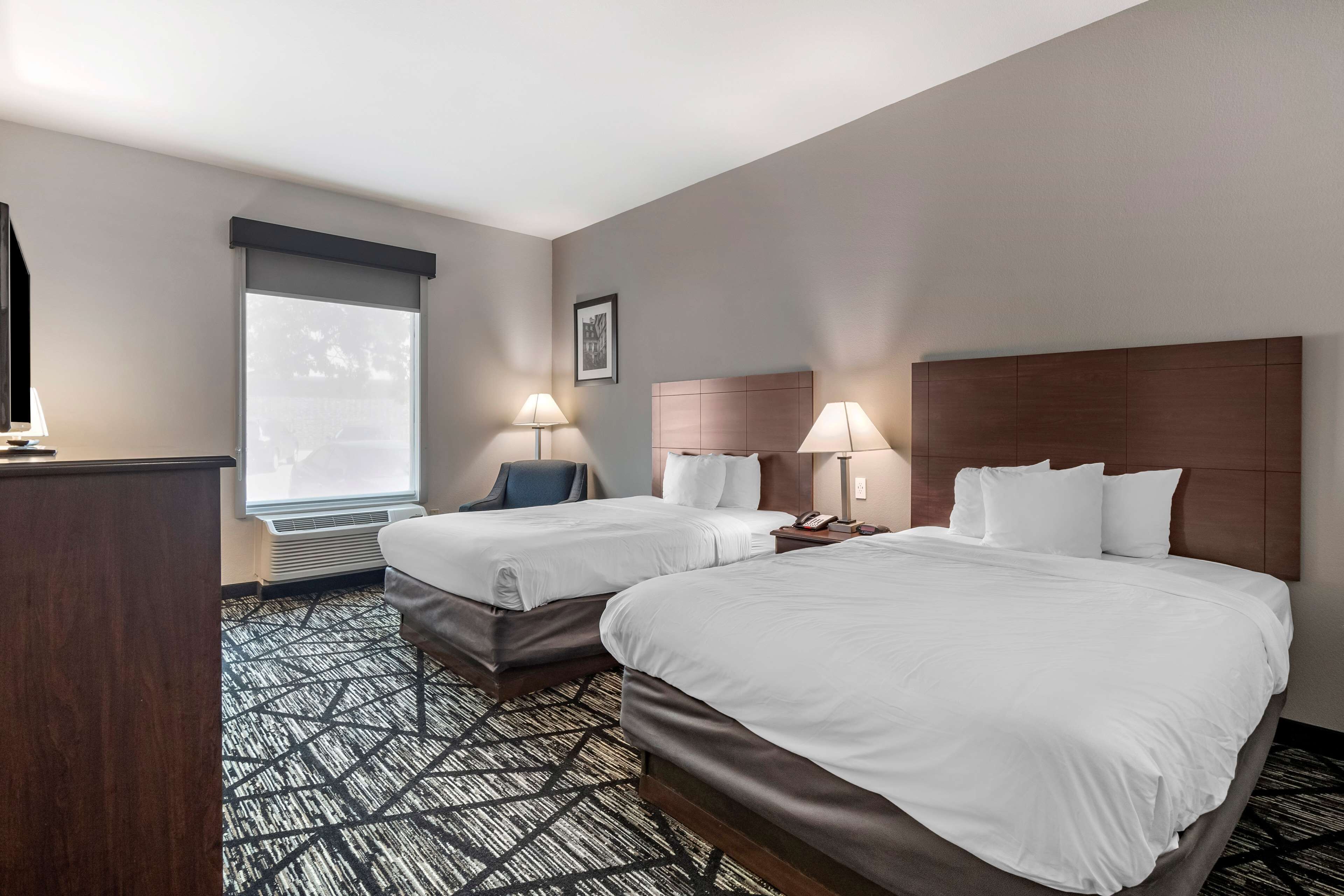 Desk, laptop workspace, blackout drapes, iron/ironing board