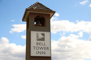 A sign for the Bell Tower Inn.