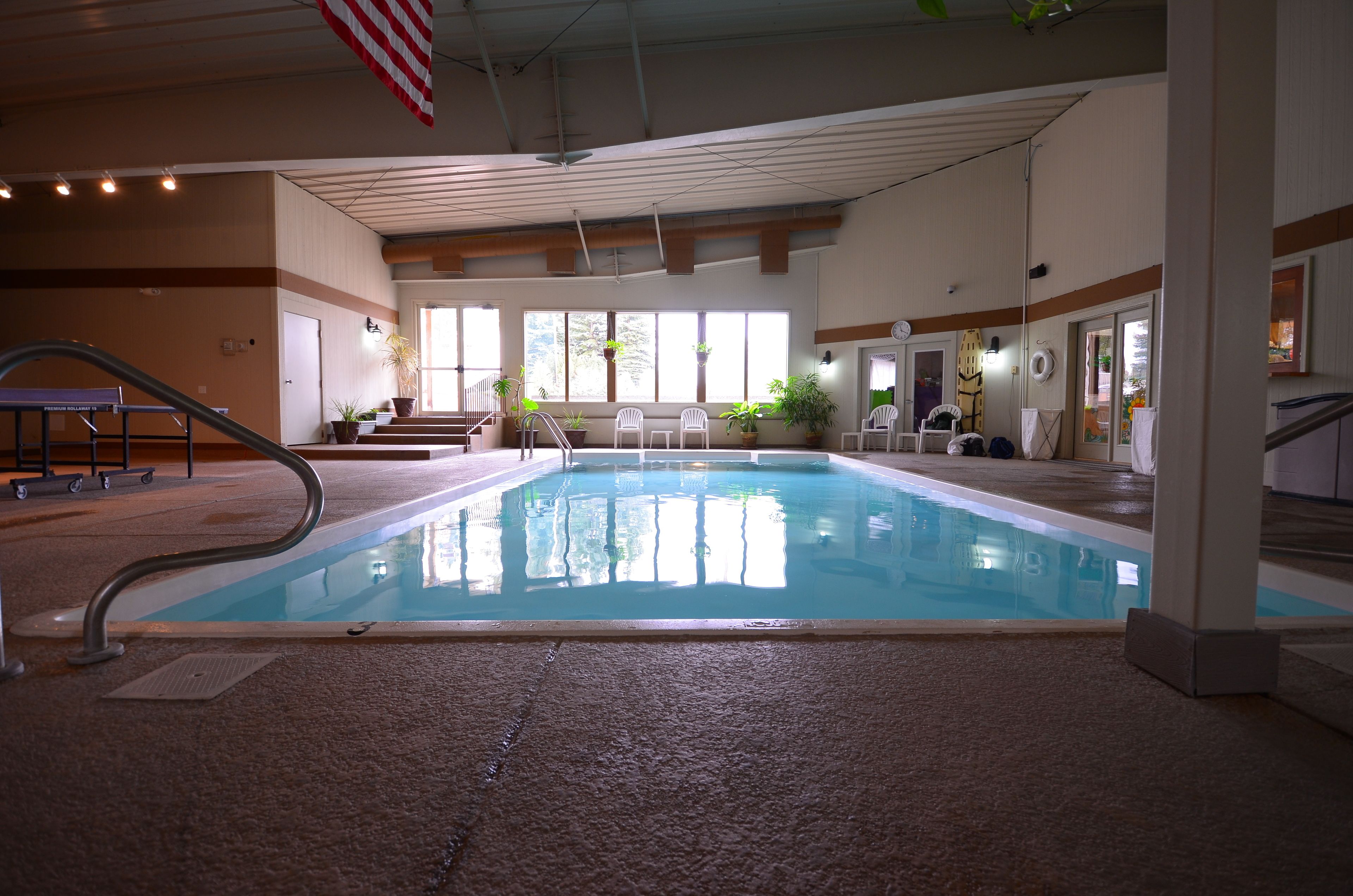 indoor pool, outdoor pool, pool loungers