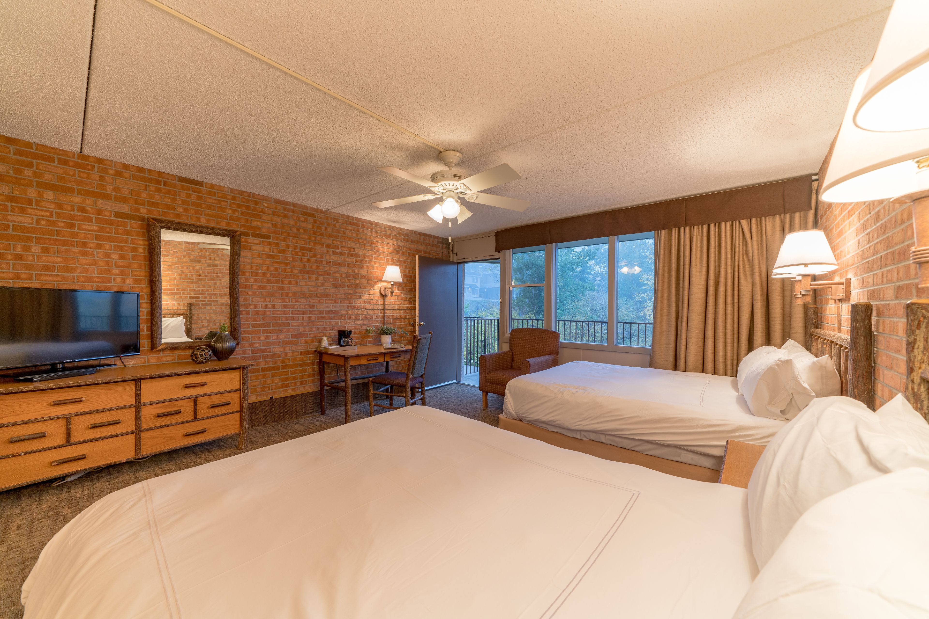 standard room, 2 queen beds | in-room safe, desk, iron/ironing board, free cots/infant beds