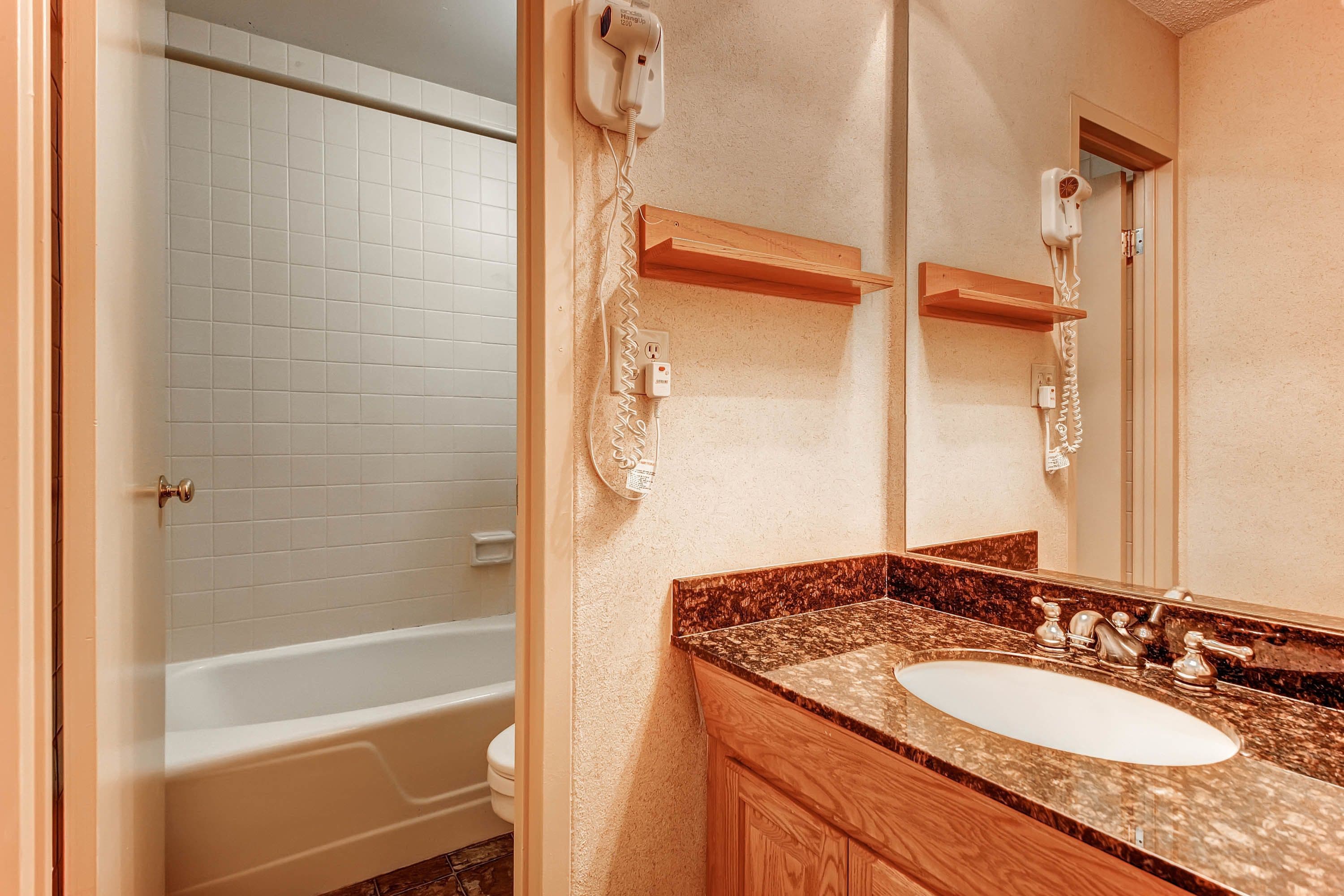 combined shower/bathtub, free toiletries, hair dryer, towels