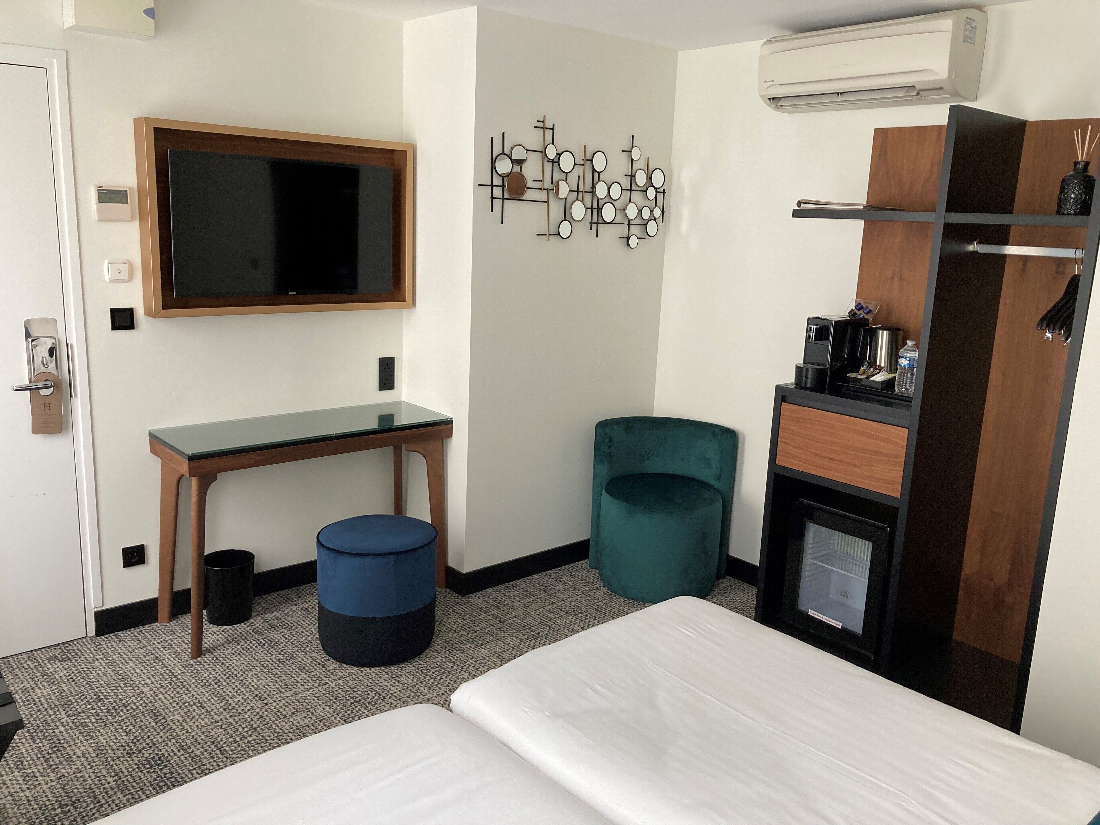 renovated room with twin beds | minibar, in-room safe, desk, soundproofing