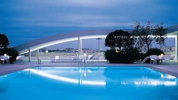 Indoor pool, outdoor pool, open 10:00 AM to 7:00 PM, pool umbrellas