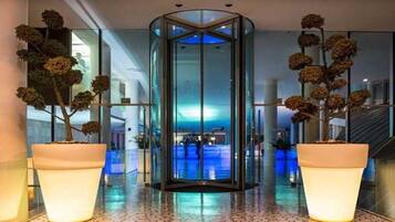 Indoor pool, outdoor pool, open 10:00 AM to 7:00 PM, pool umbrellas