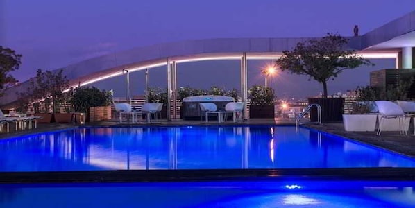 Indoor pool, outdoor pool, open 10:00 AM to 7:00 PM, pool umbrellas