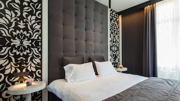 Suite junior | 1 habitación, ropa de cama de alta calidad y minibar