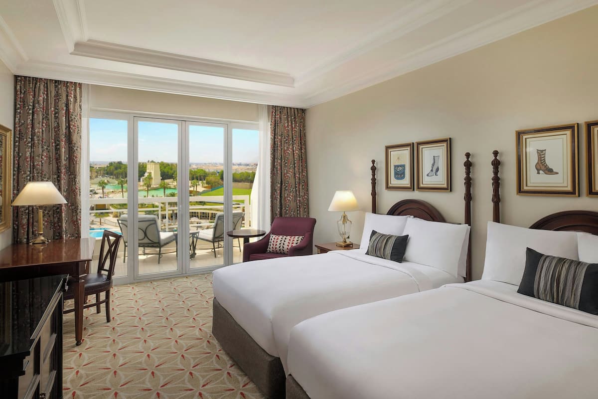 Deluxe Room, 2 Double Beds (Golf or Pool View) | Pillowtop beds, minibar, in-room safe, desk