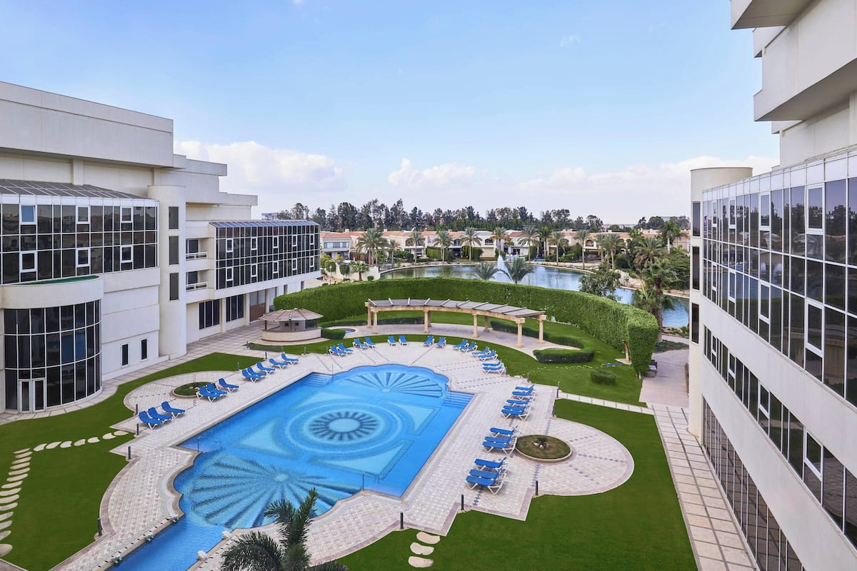 Indoor pool, outdoor pool, open 8:00 AM to 6:00 PM, pool umbrellas