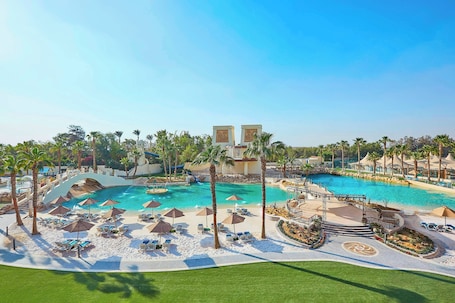 Private beach, white sand, beach umbrellas, beach towels. JW Marriott Hotel Cairo