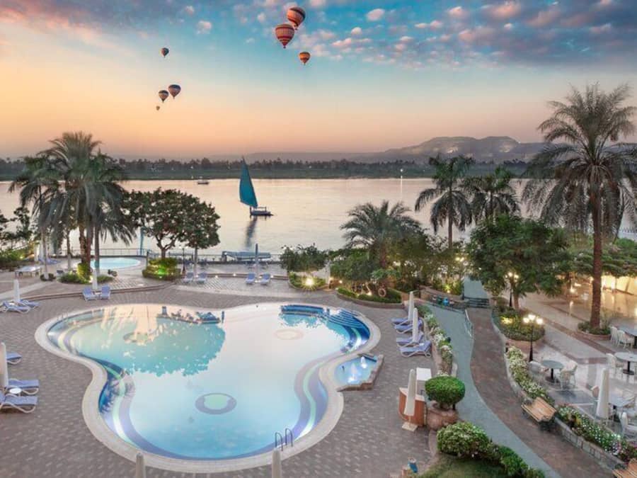 2 outdoor pools, pool umbrellas, pool loungers
