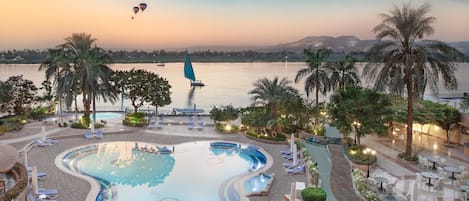 2 outdoor pools, pool umbrellas, sun loungers