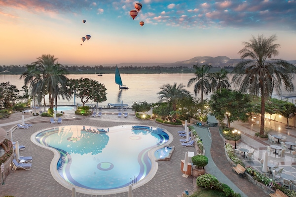 2 outdoor pools, pool umbrellas, sun loungers