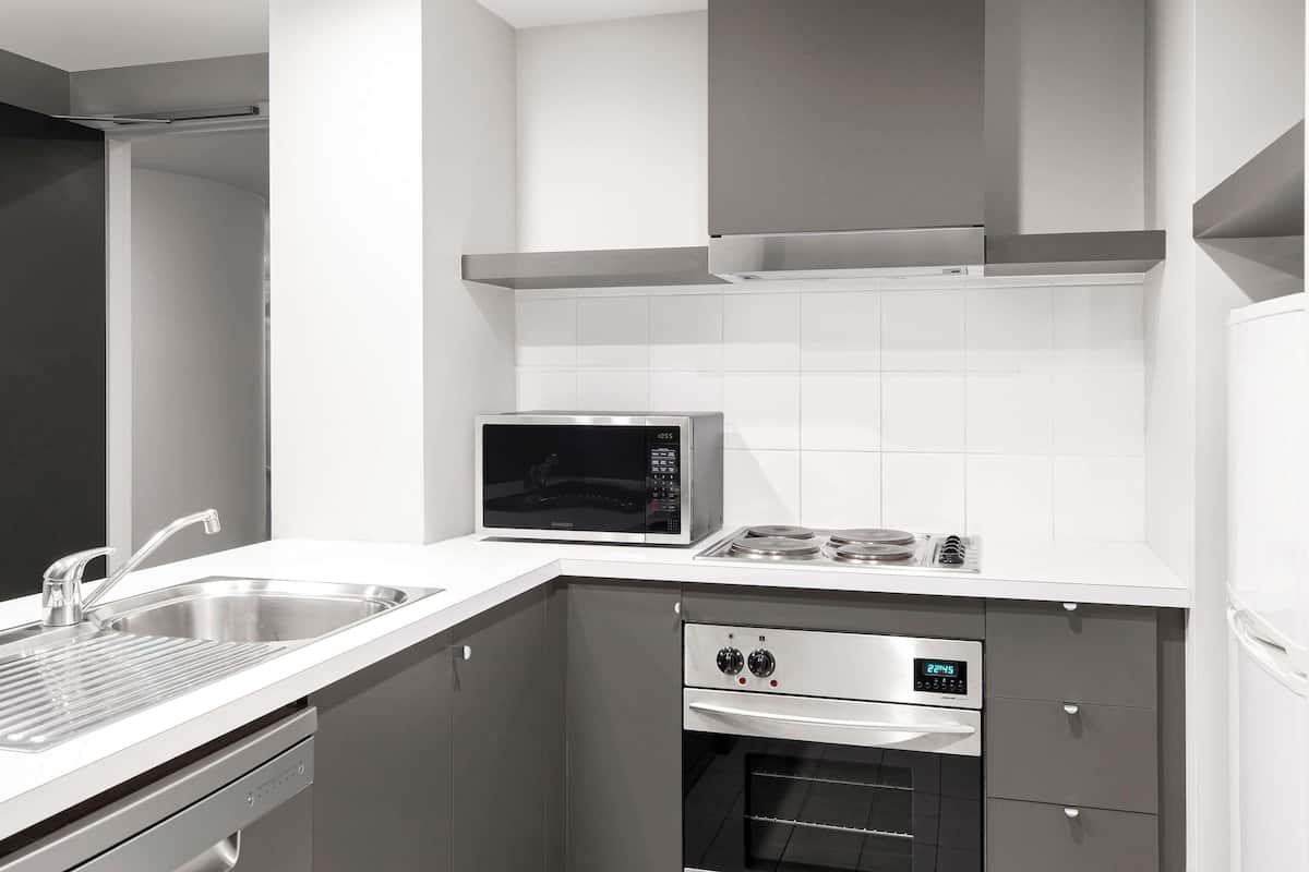 In-room safe, desk, laptop workspace, blackout curtains