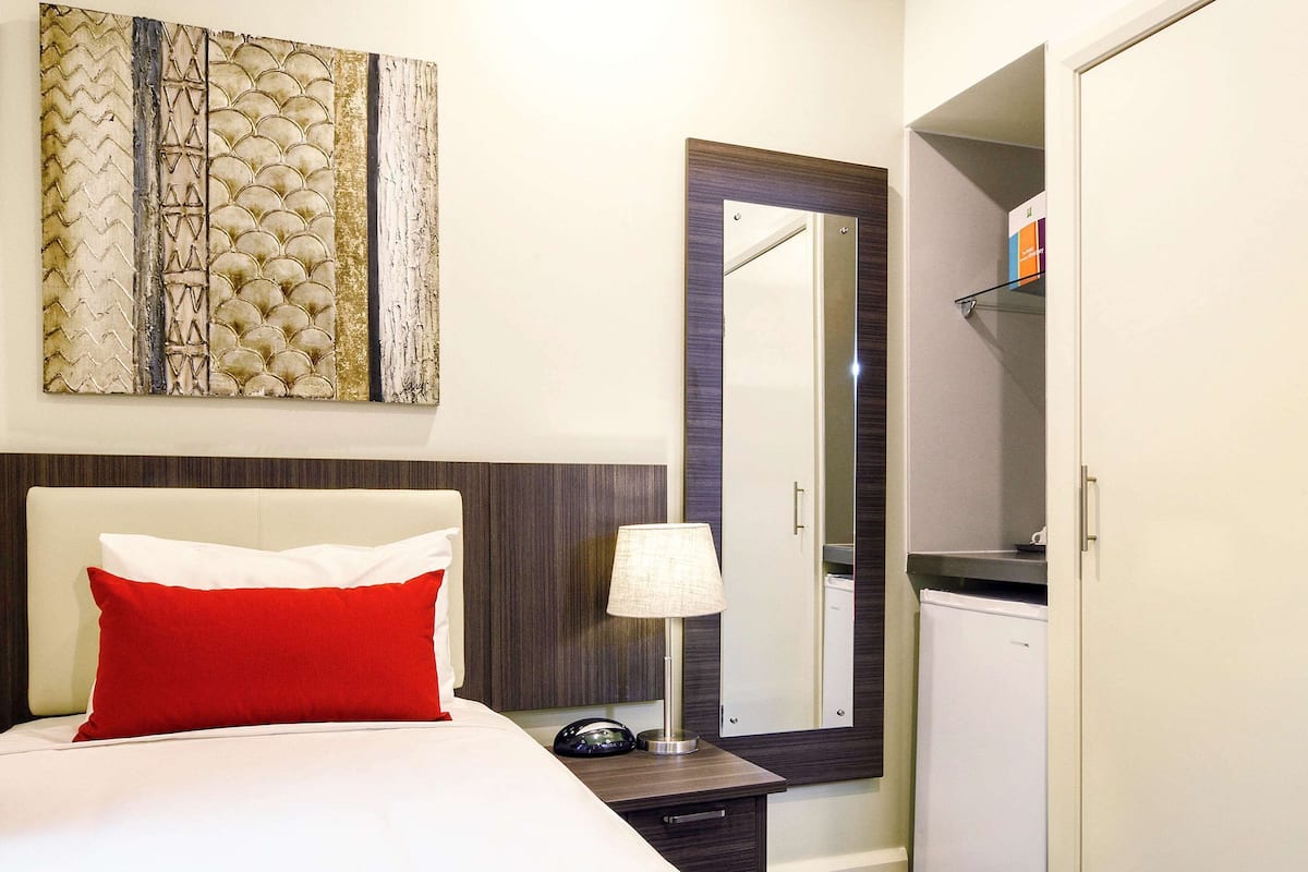 Standard Room, 1 Twin Bed | 1 bedroom, in-room safe, iron/ironing board, free WiFi