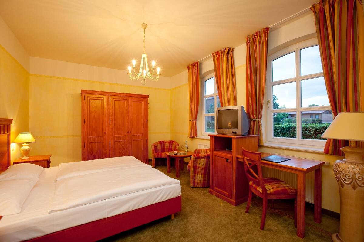 Standard Apartment | Minibar, iron/ironing board, high-speed internet, alarm clocks