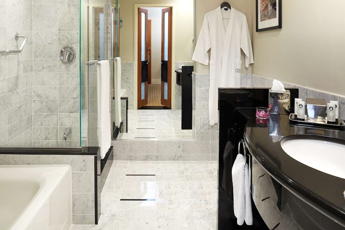 Designer toiletries, hair dryer, bathrobes, slippers