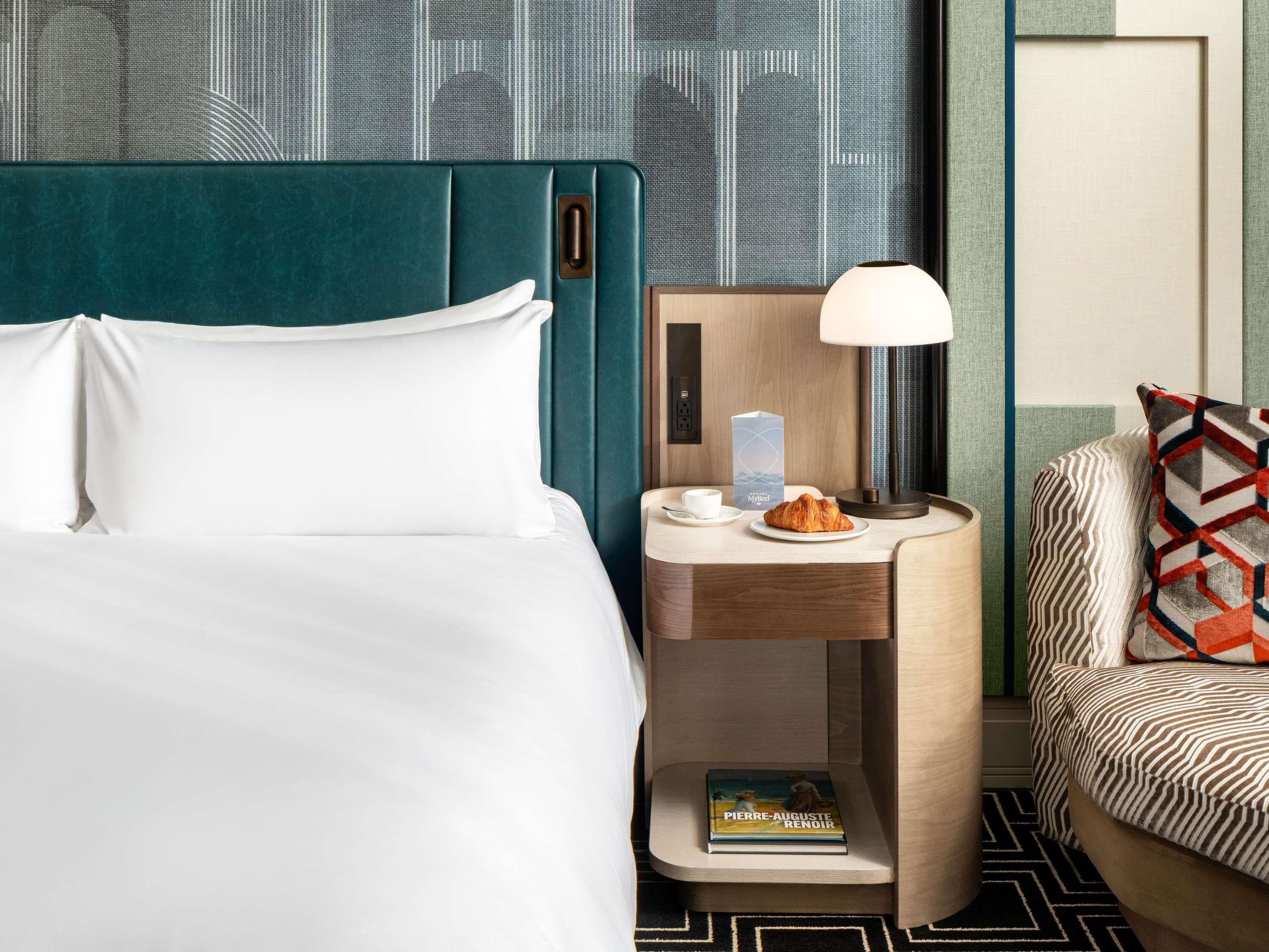 Premium bedding, down comforters, pillowtop beds, minibar