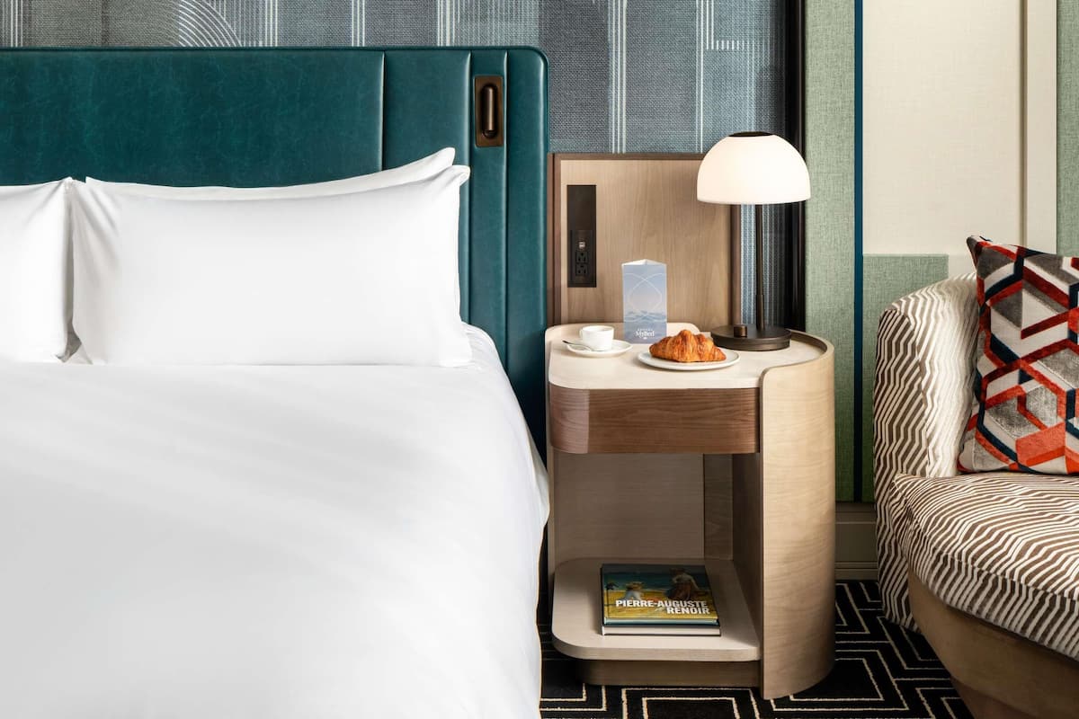 Premium bedding, down comforters, pillowtop beds, minibar