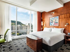 Premium bedding, down comforters, pillowtop beds, minibar