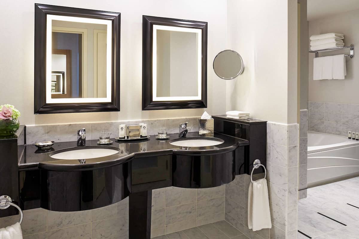 Designer toiletries, hair dryer, bathrobes, slippers