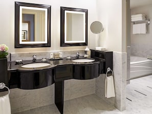 Designer toiletries, hair dryer, bathrobes, slippers