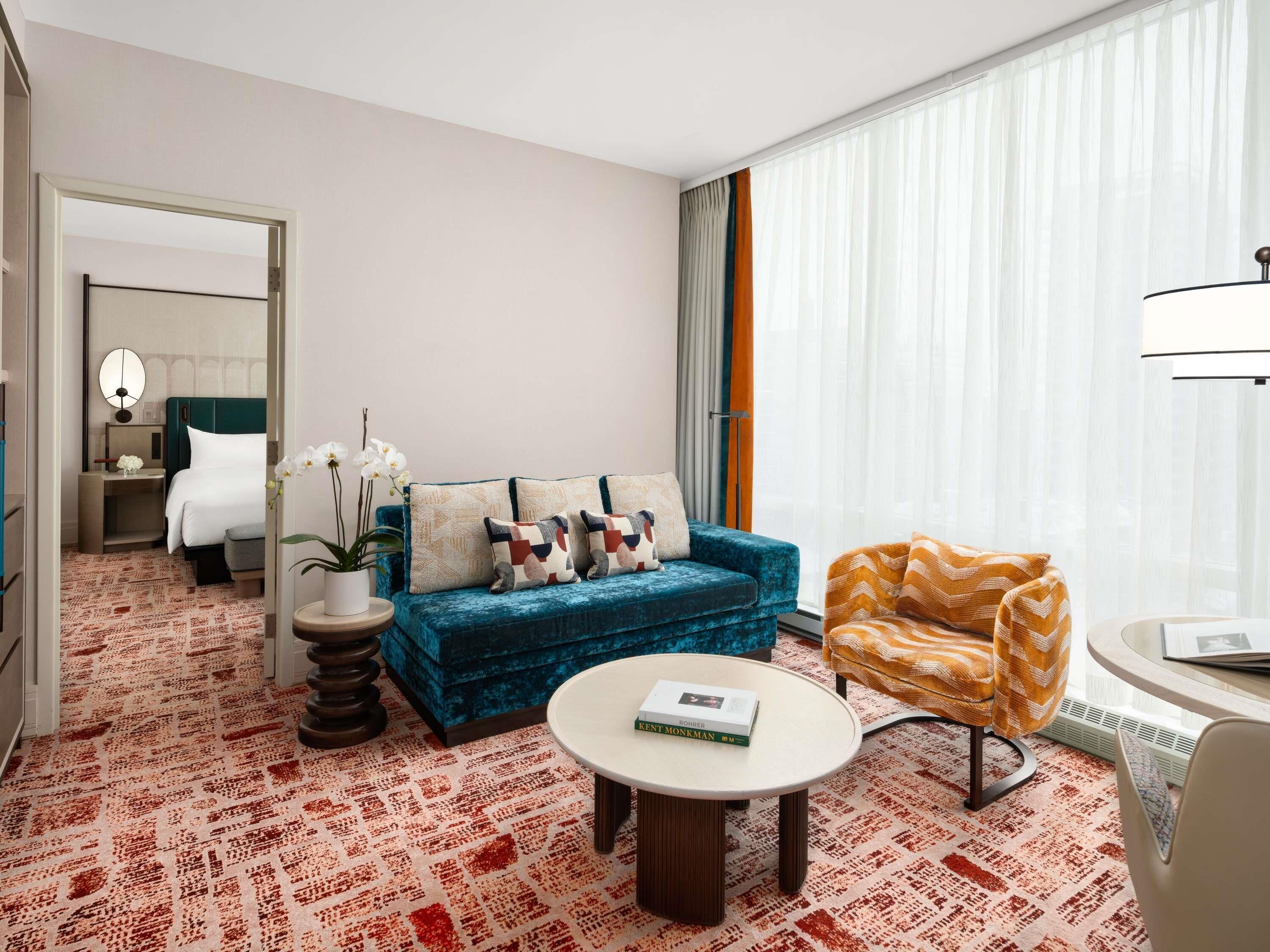 Premium bedding, down comforters, pillowtop beds, minibar