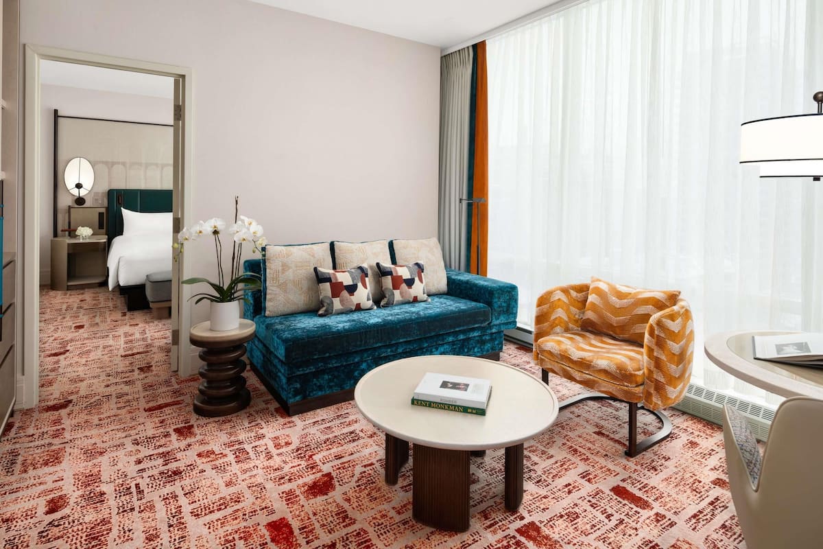 Premium bedding, down comforters, pillowtop beds, minibar