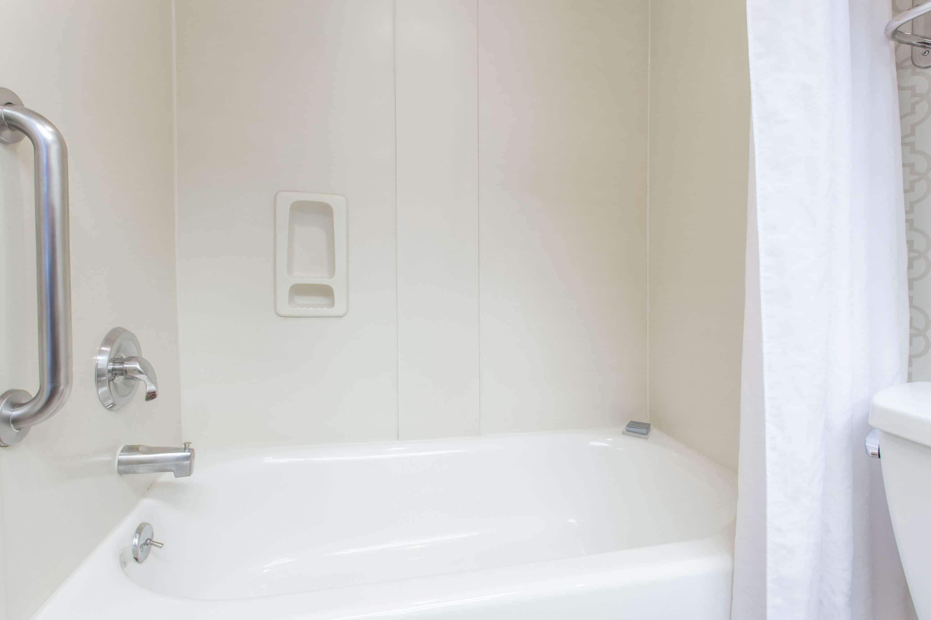 combined shower/bathtub, free toiletries, hair dryer, towels