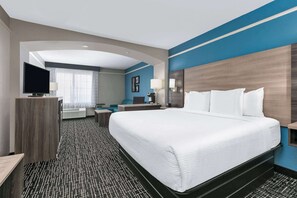 Suite Deluxe, 1 cama King size, para no fumadores | Ropa de cama de alta calidad, escritorio y cortinas blackout 