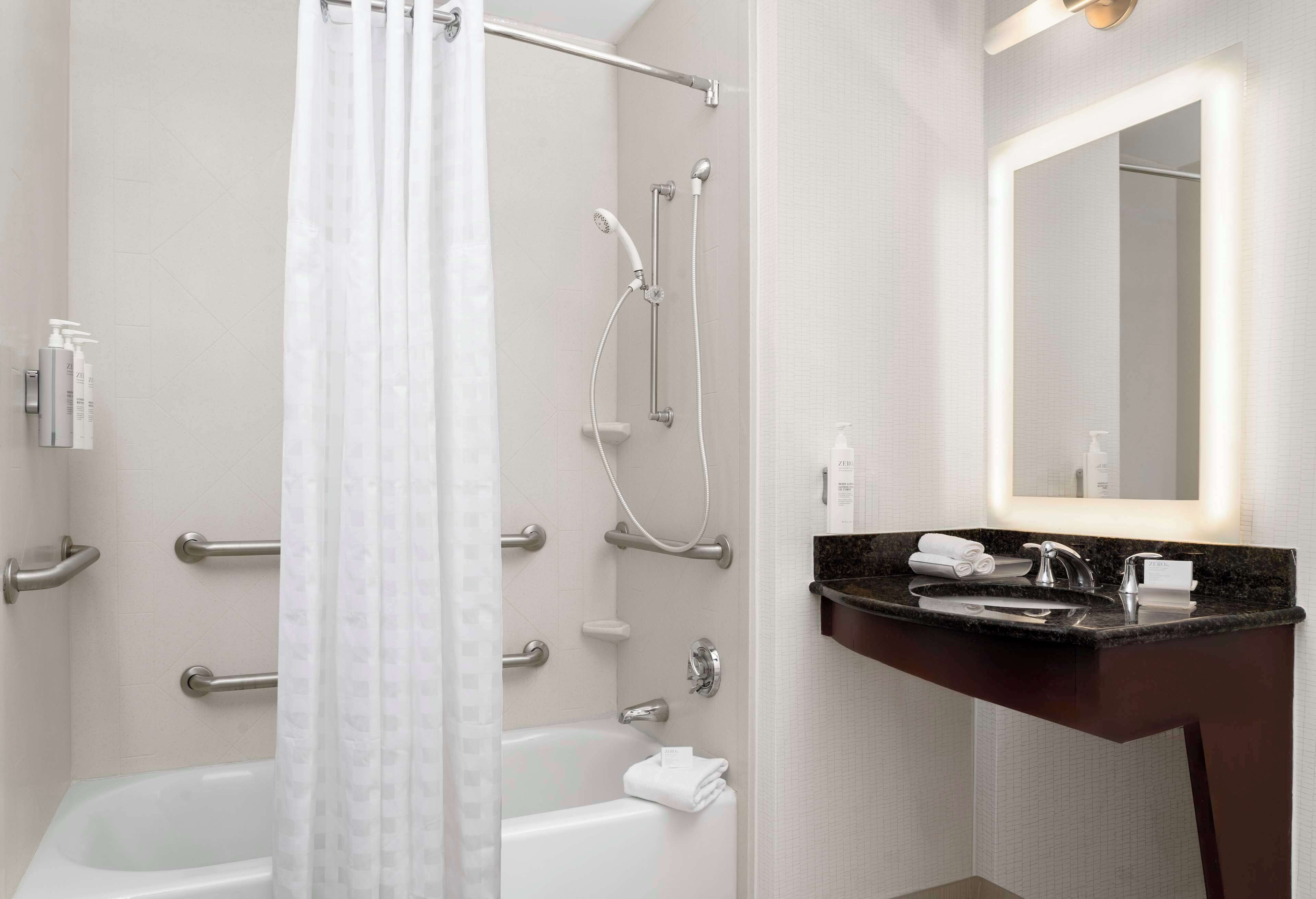 deep-soaking bathtub, free toiletries, hair dryer, bathrobes