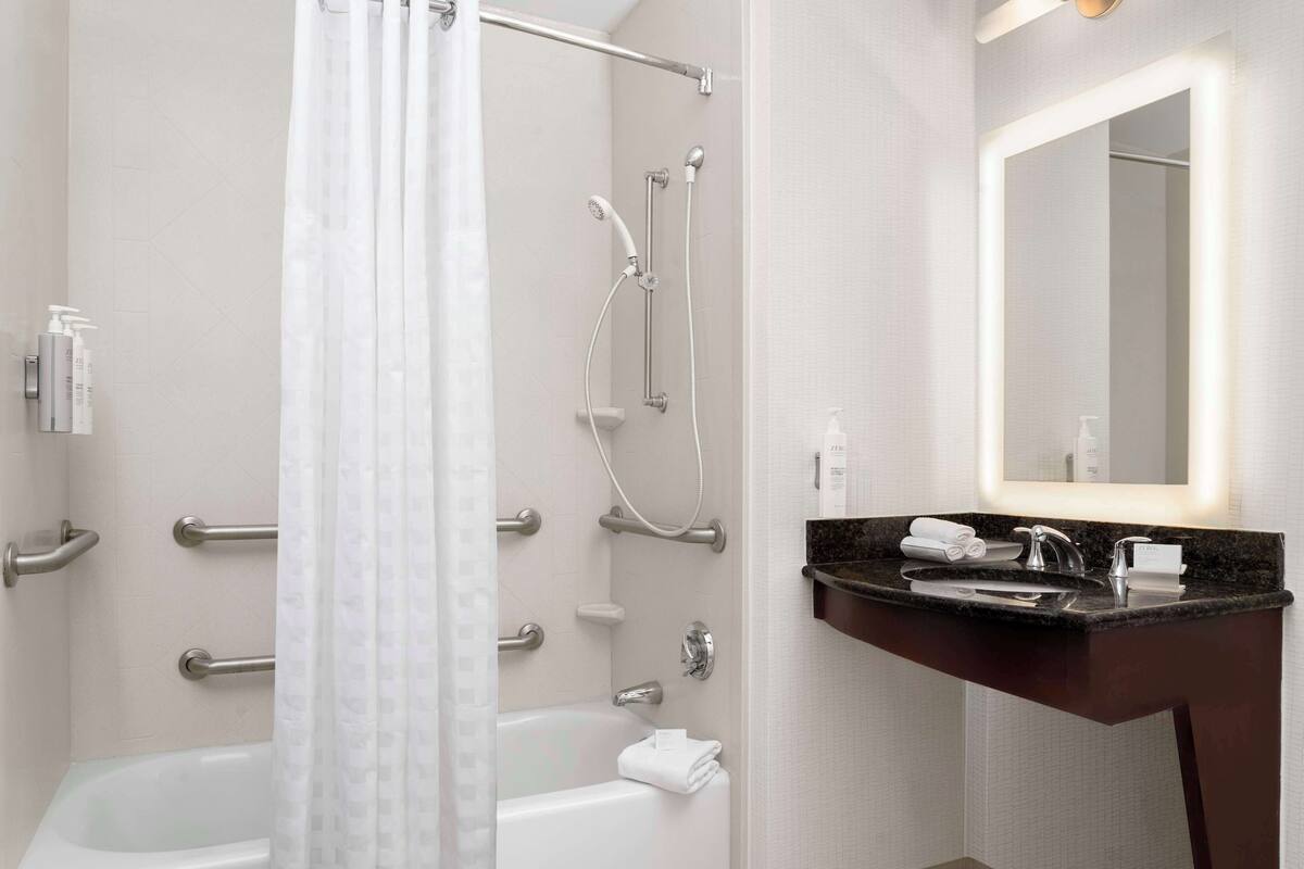 deep-soaking bathtub, free toiletries, hair dryer, bathrobes