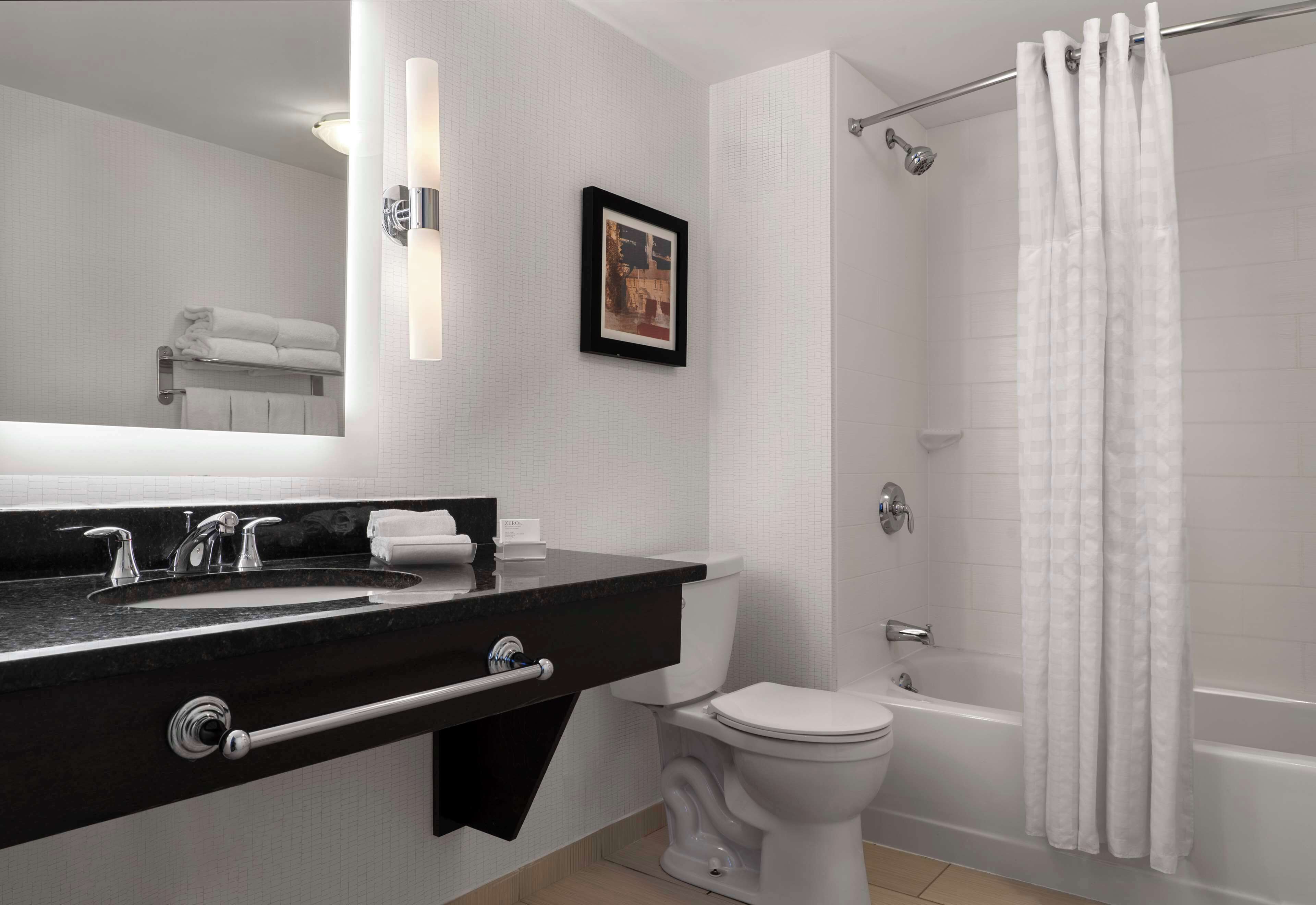 deep-soaking bathtub, free toiletries, hair dryer, bathrobes